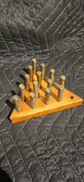 Handmade Wooden Peg Game with 556 Shell Casing Pegs – Travel Size