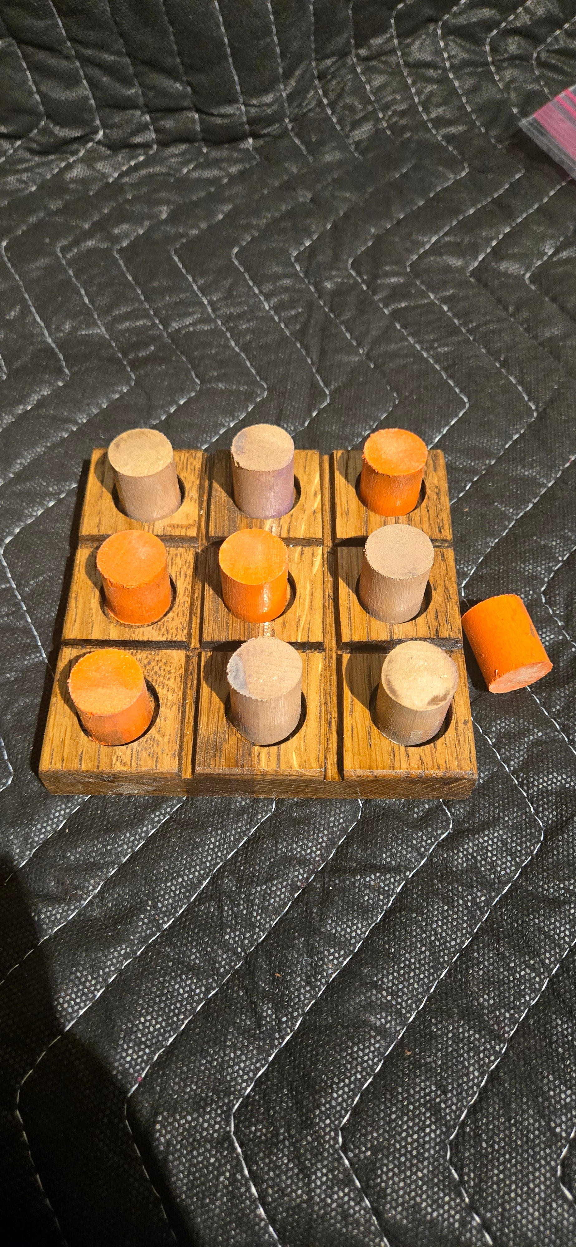 Tan, orange tic tac toe