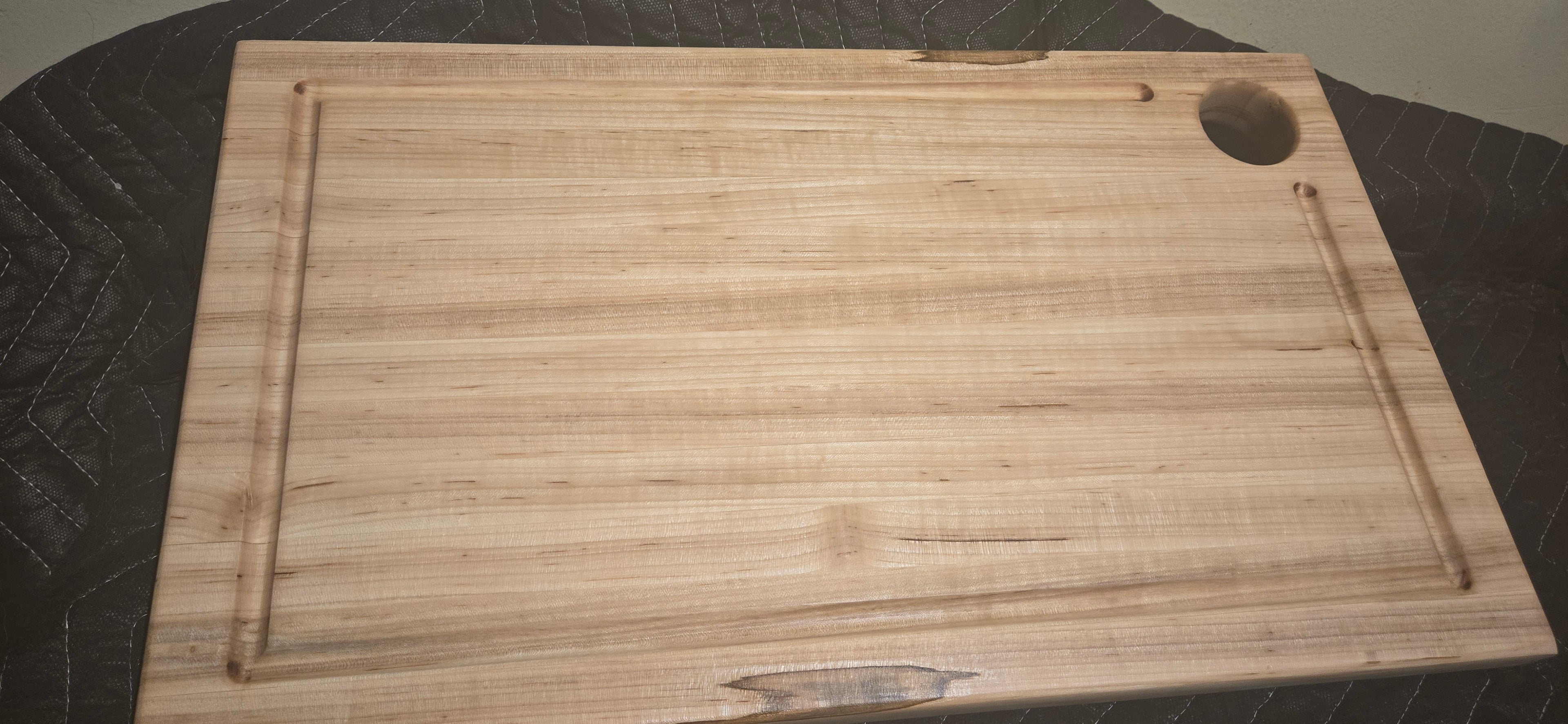 Ambrosia maple BBQ cutting board with cut out handle